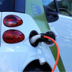An electric car plugged in being charged