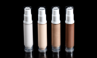 Four pots with foundation of differing colours for different skin tones