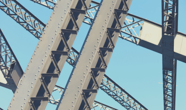 Metal pylons against a blue sky